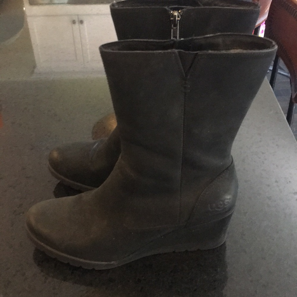 Black suede Ugg platform booties.